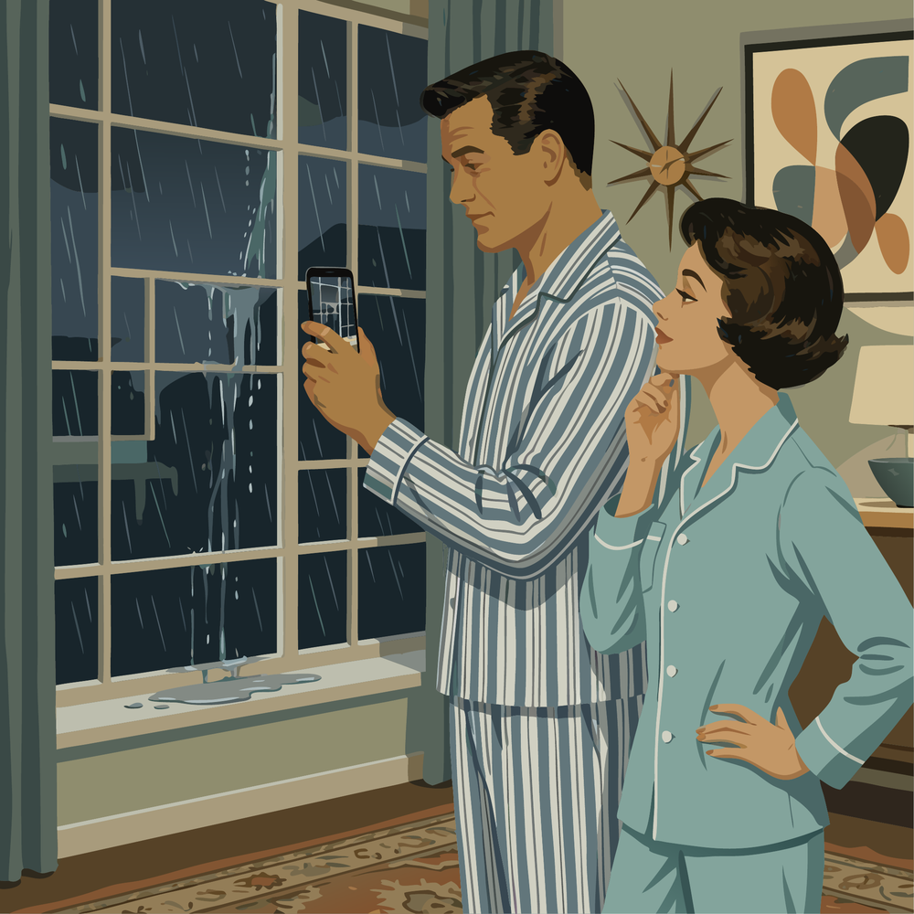 A couple in pajamas at night, calmly photographing a leak coming through their window with the Mantle app instead of panicking.